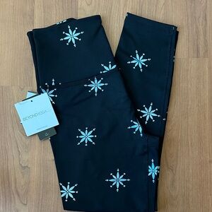 Beyond Yoga Black Leggings with Blue Snowflake Pattern
